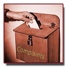 Person putting a complaint in a complaint box